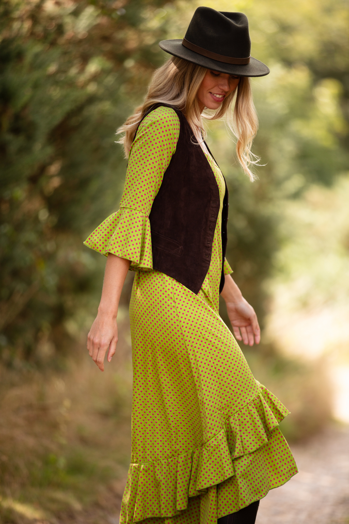 Shocking pink top and green dress